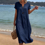 ZOFIA ATELIER navy blue short sleeve polyester midi dress with v-neck and decorative buttons.