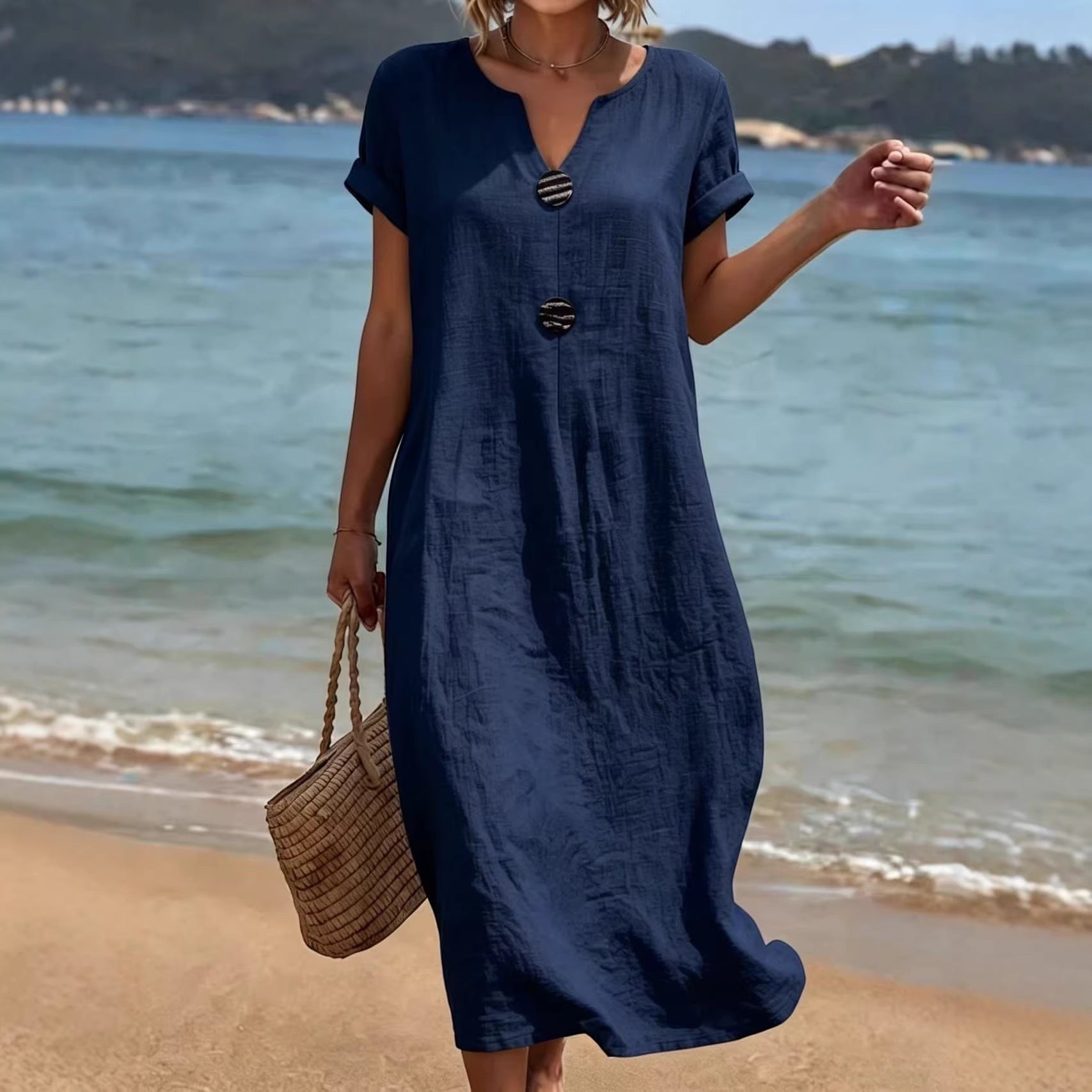 ZOFIA ATELIER navy blue short sleeve polyester midi dress with v-neck and decorative buttons.