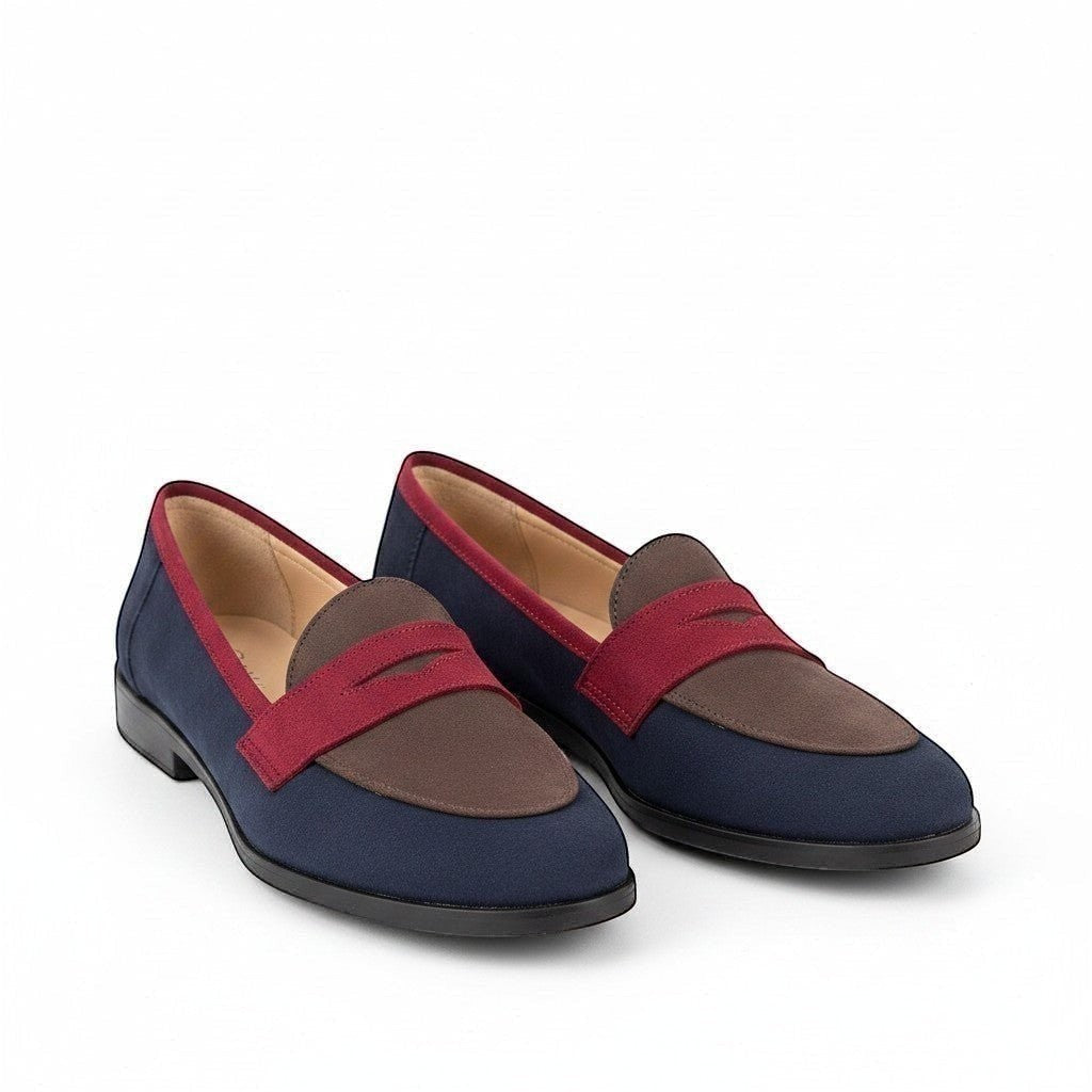 ZOFIA ATELIER navy blue and brown suede slip-on loafers with red trim and a round toe.