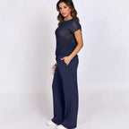 ZOFIA ATELIER navy blue crew-neck sweater with hollow-out detail and wide-leg pants set