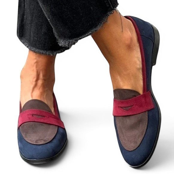 ZOFIA ATELIER navy blue and burgundy suede slip-on loafers with round toe and contrast stitching.