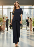 ZOFIA ATELIER navy blue chiffon patchwork set with wide-leg pants and layered top.