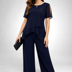 ZOFIA ATELIER navy blue chiffon patchwork set with wide-leg pants and layered top with cold shoulder detail.