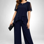 ZOFIA ATELIER navy blue chiffon patchwork set with wide-leg pants and layered top with cold shoulder detail.