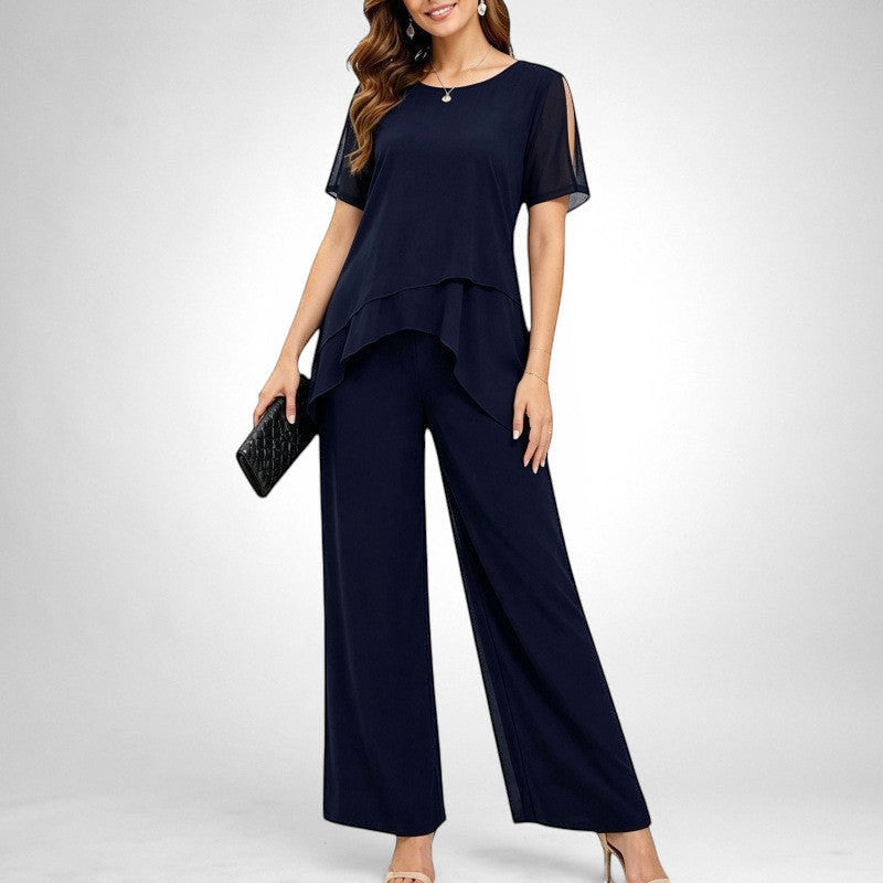 ZOFIA ATELIER navy blue chiffon patchwork set with wide-leg pants and layered top with cold shoulder detail.