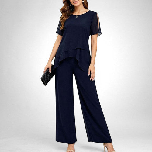 ZOFIA ATELIER navy blue chiffon patchwork set with wide-leg pants and layered top with cold shoulder detail.