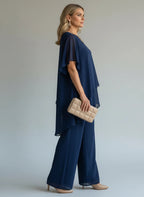 ZOFIA ATELIER navy blue chiffon suit set with quarter sleeves and wide-leg trousers, worn by a model.
