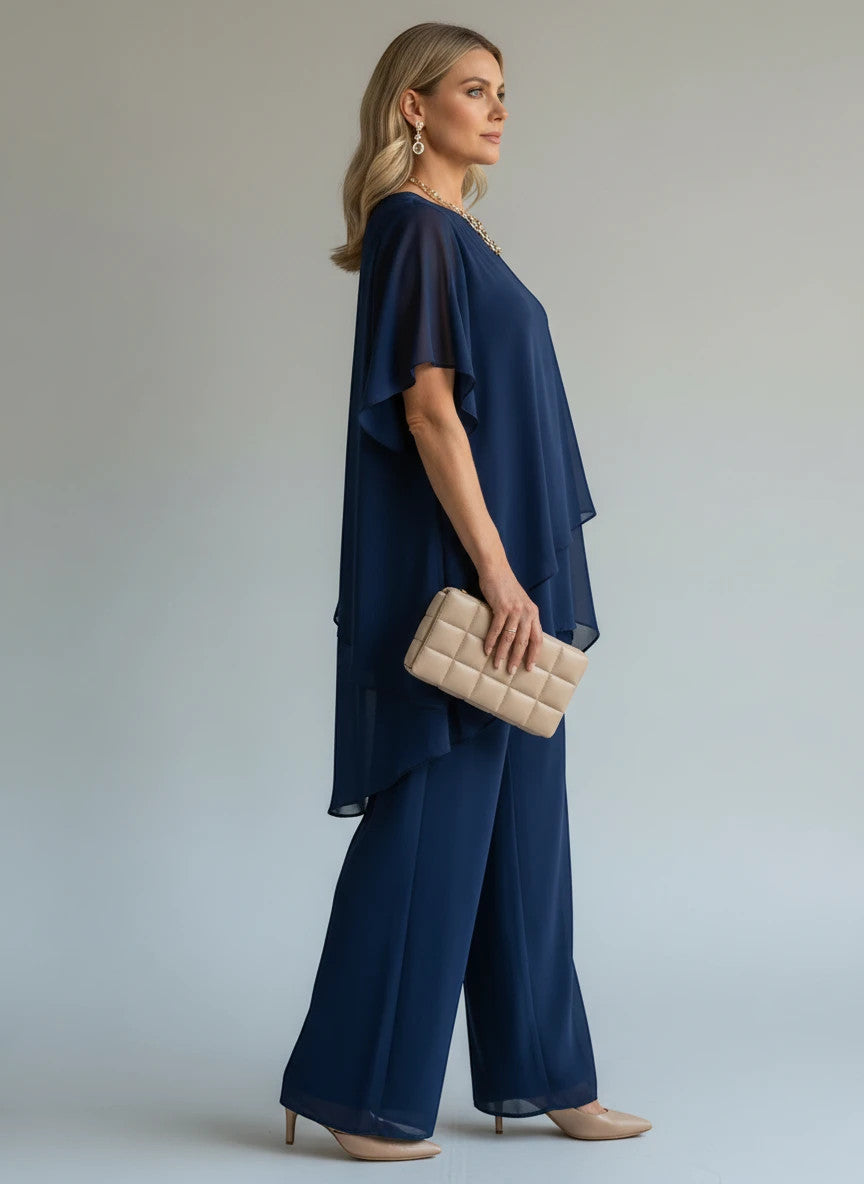ZOFIA ATELIER navy blue chiffon suit set with quarter sleeves and wide-leg trousers, worn by a model.