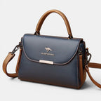 ZOFIA ATELIER navy blue genuine leather crossbody shoulder bag with brown accents and silver kangaroo logo.