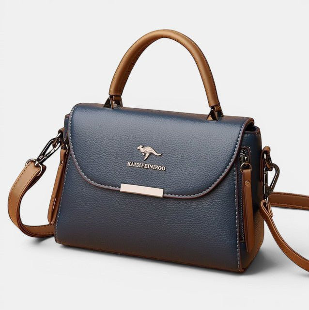 ZOFIA ATELIER navy blue genuine leather crossbody shoulder bag with brown accents and silver kangaroo logo.