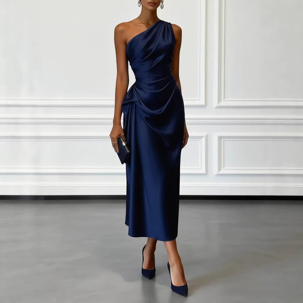 ZOFIA ATELIER navy blue satin one-shoulder midi dress with waist-cinching detail and flowing skirt.