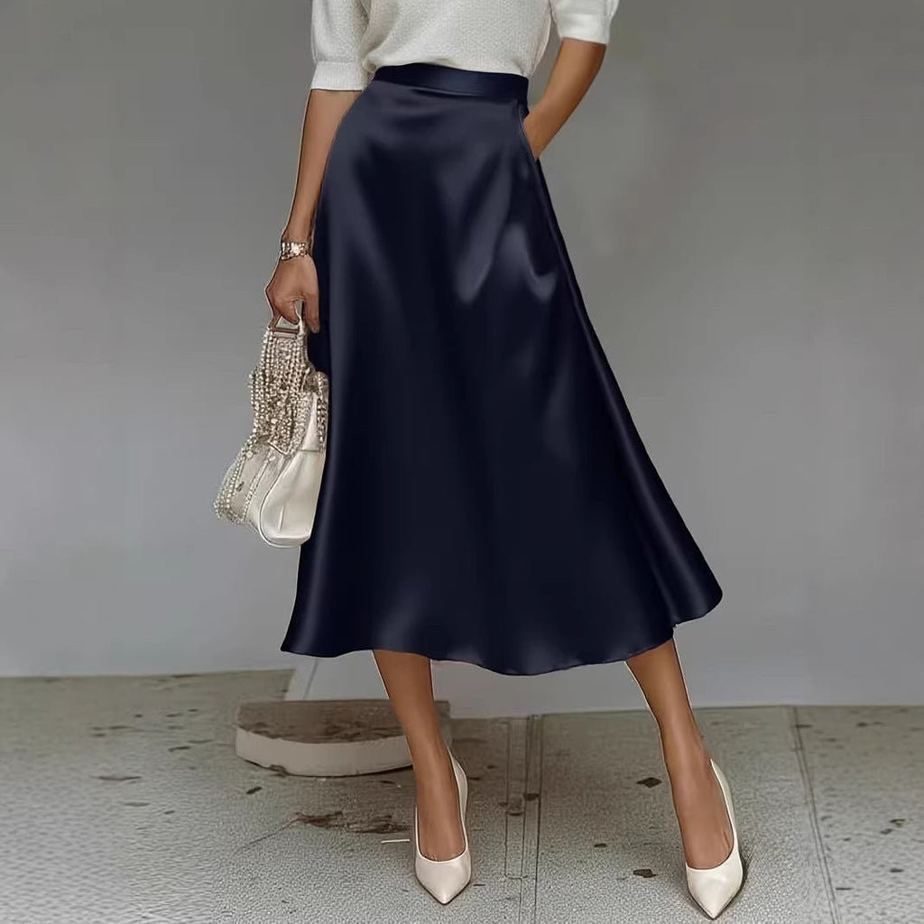 ZOFIA ATELIER navy blue satin mid-length skirt with a slight stretch and flowy silhouette.