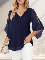 ZOFIA ATELIER navy blue split-sleeve V-neck blouse with a flowing fit and subtle sheen.