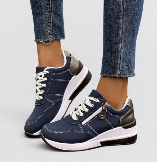 ZOFIA ATELIER navy blue wedge sneakers with white laces and side zipper. Round toe, artificial PU.