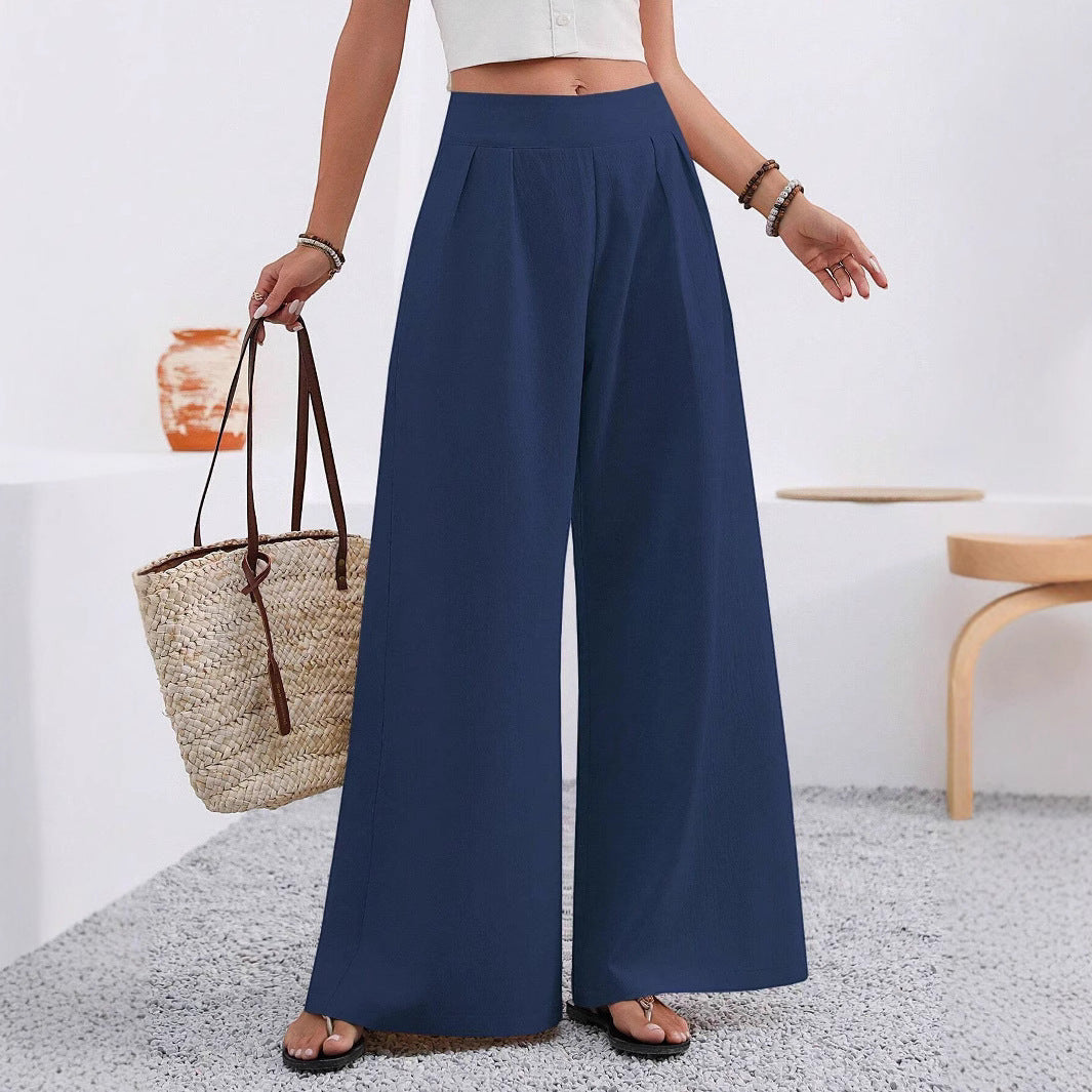 ZOFIA ATELIER navy blue polyester high-waisted wide-leg trousers with pockets.