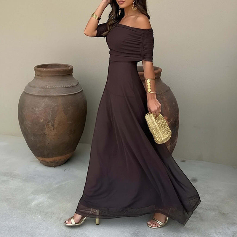 ZOFIA ATELIER ANDREA off-shoulder sheer maxi dress in dark brown, made of stretch polyester with a high waist.