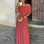 ZOFIA ATELIER coral off-shoulder sheer maxi dress with high waist, made of stretch polyester.