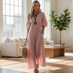 ZOFIA ATELIER off-shoulder maxi dress in pink and white stripes, made of polyester, with short sleeves and pockets.