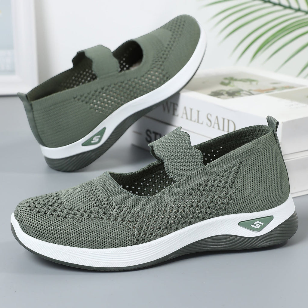 ZOFIA ATELIER olive green knit slip-on walking shoes with white soles and a low heel.
