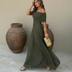 ZOFIA ATELIER olive green off-shoulder sheer maxi dress with ruched detail and high waist. Stretch polyester.