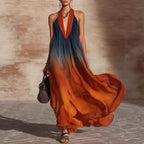 ZOFIA ATELIER orange and blue ombre sleeveless maxi dress with a deep V-neck and wide hem.