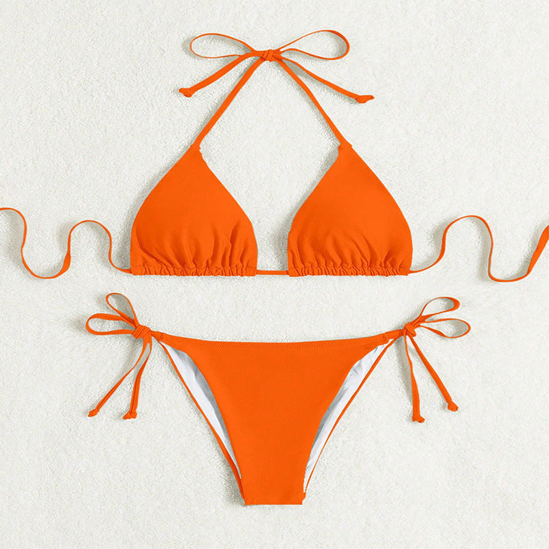 ZOFIA ATELIER bright orange polyester halter bikini with tie-side briefs. Perfect for swimming and sports trends.