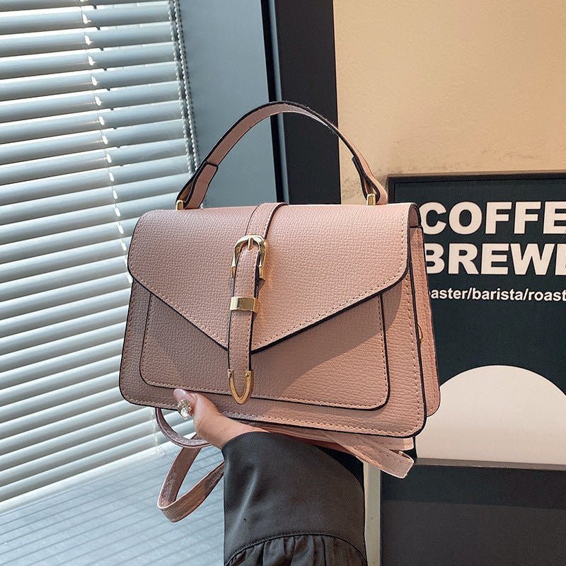 ZOFIA ATELIER Patrycja messenger bag em pele PU rosa com fecho de fivela dourada e alça de ombro. Elegante e moderna.