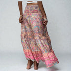 ZOFIA ATELIER patterned maxi skirt with elastic waist, ruffles, and patchwork in ethnic style. Flowing silhouette.