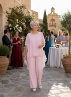 ZOFIA ATELIER light pink flowy chiffon ensemble with loose-fitting top and ankle-length pants.