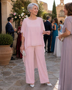 ZOFIA ATELIER flowy pink chiffon ensemble with wide-leg pants and layered top. Elegant casual wear.