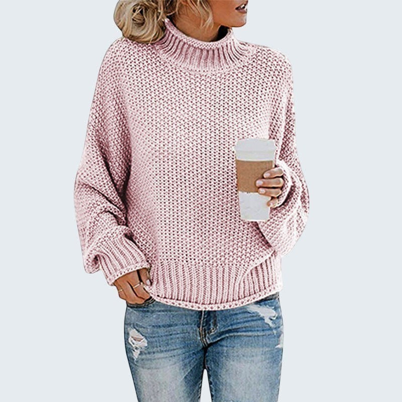 ZOFIA ATELIER pink chunky knit turtleneck sweater with relaxed fit and ribbed cuffs and hem.