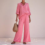 ZOFIA ATELIER pink cotton lounge set with V-neck long sleeve top and wide-leg pants.