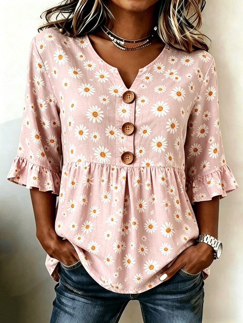 ZOFIA ATELIER pink short-sleeved polyester top with a white daisy print, V-neck, and wooden buttons.