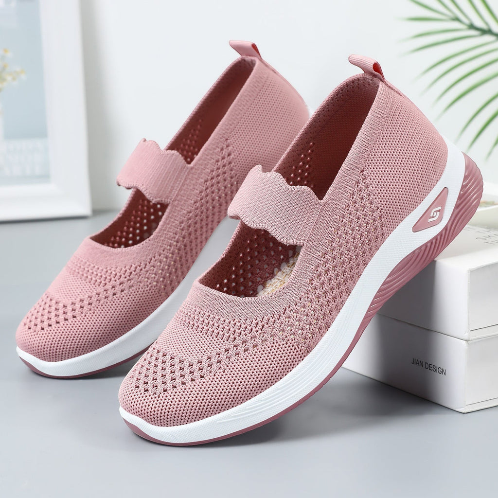 ZOFIA ATELIER pink knit mary jane walking shoes with white soles and elastic strap.