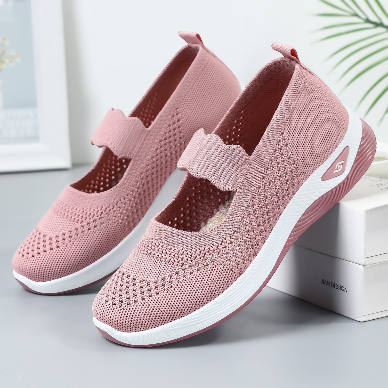 ZOFIA ATELIER pink knit mary jane walking shoes with white soles and elastic strap.
