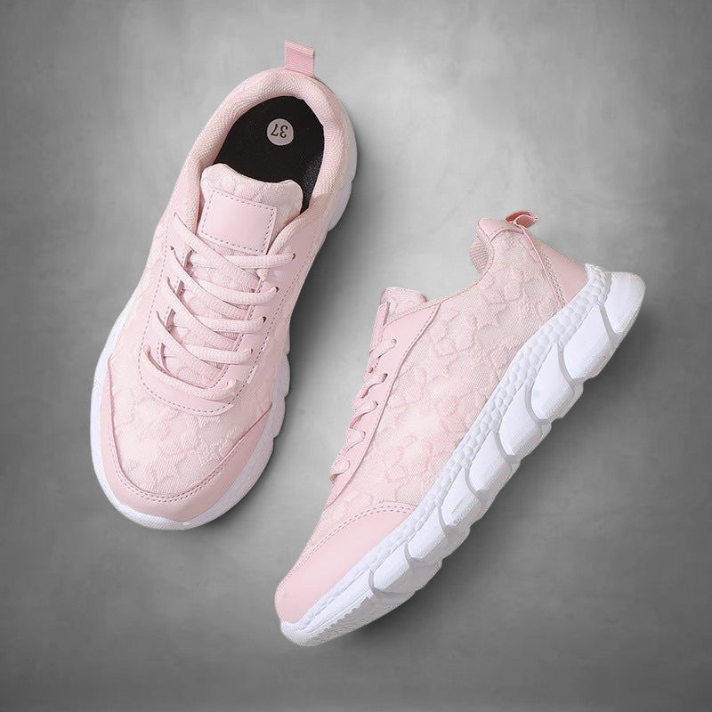 ZOFIA ATELIER pink lace-up casual running sneakers with white rubber soles and breathable mesh upper.