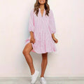 ZOFIA ATELIER pink and white plaid polyester dress with short sleeves and tiered skirt.