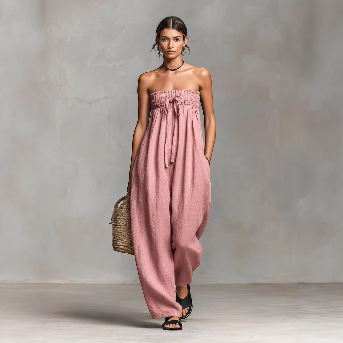 ZOFIA ATELIER pink ruched strapless polyester jumpsuit with a tie waist and wide legs