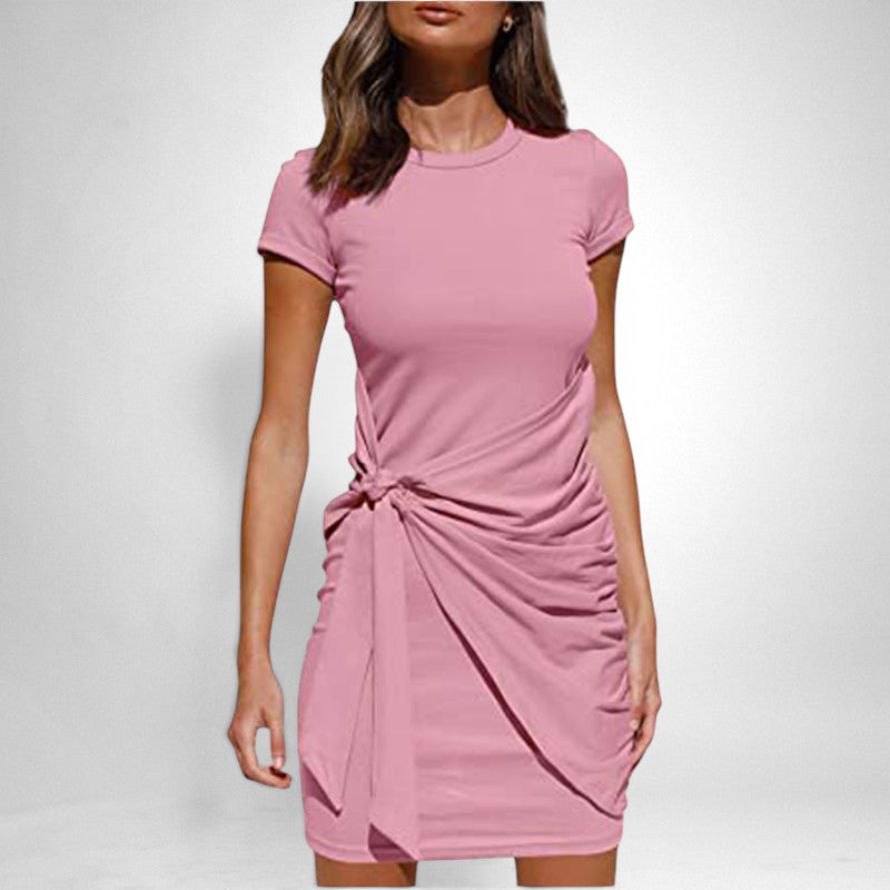 ZOFIA ATELIER pink short-sleeve cotton blend ruched mini dress with a tie-knot detail.