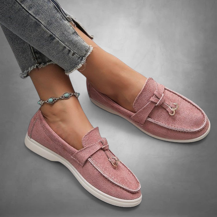ZOFIA ATELIER pink suede loafers with decorative bow and tassel detail, slip-on style with flexible sole.