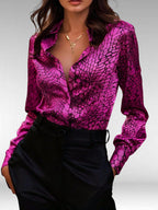 ZOFIA ATELIER Małgorzata long sleeve button-up polyester shirt with a vibrant pink zebra print.
