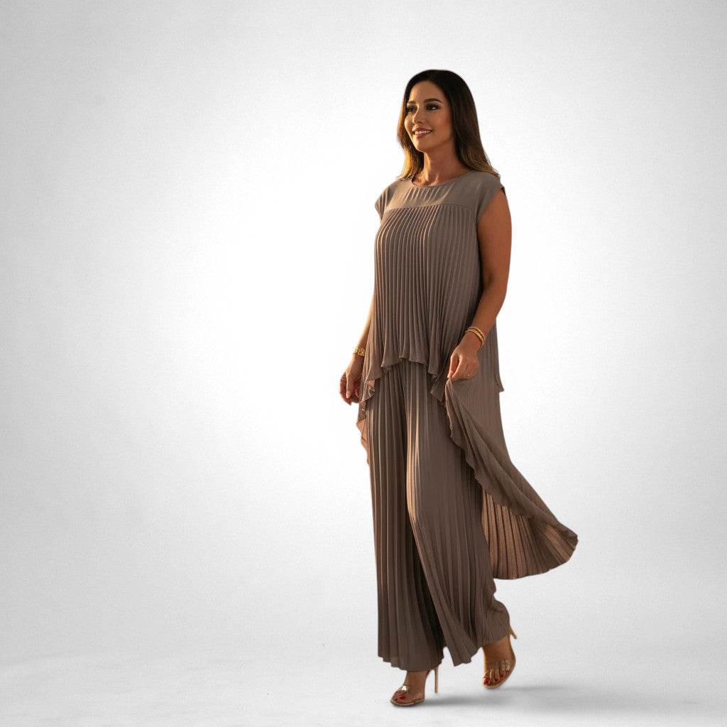 ZOFIA ATELIER taupe pleated short sleeve suit with wide leg pants, elegant and flowing silhouette.