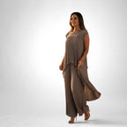 ZOFIA ATELIER taupe pleated short sleeve suit with wide leg pants, elegant and flowing silhouette.