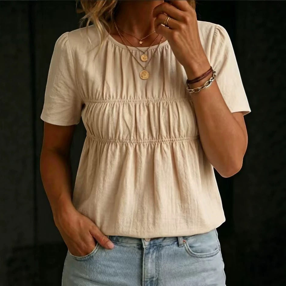 ZOFIA ATELIER beige cotton linen blend short-sleeve crew-neck top with smocked bodice and loose fit.