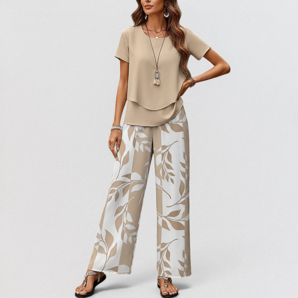 ZOFIA ATELIER elegant beige top and wide-leg pants set with a beige and white leaf print. Polyester.