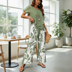 ZOFIA ATELIER women's green top and white wide-leg pants set with green leaf print, three-quarter sleeves.