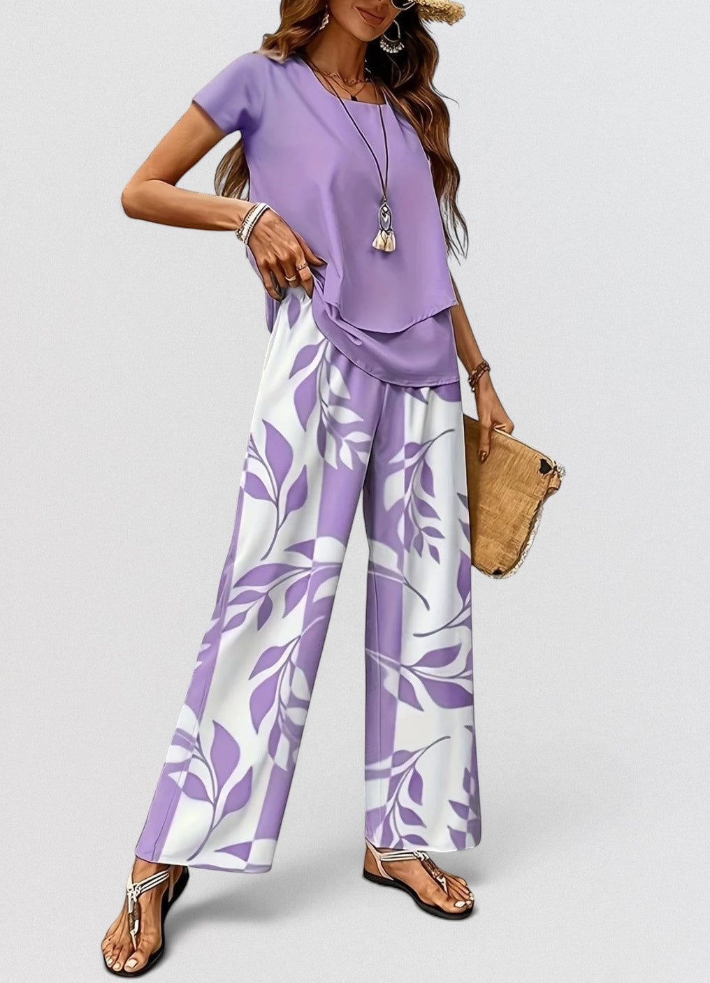ZOFIA ATELIER purple and white floral print polyester pants set with a lavender top.