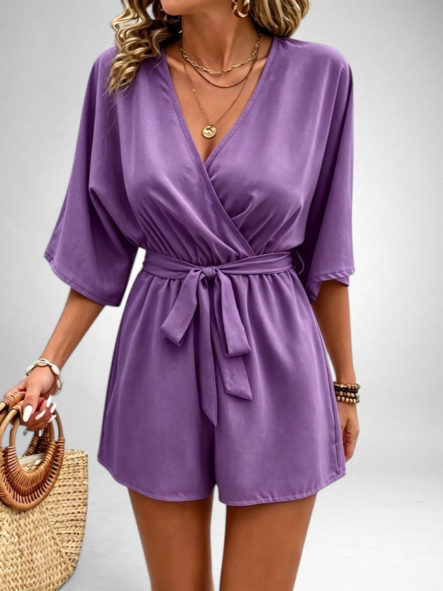 ZOFIA ATELIER Isabella purple V-neck linen blend jumpsuit with tie waist and short sleeves.