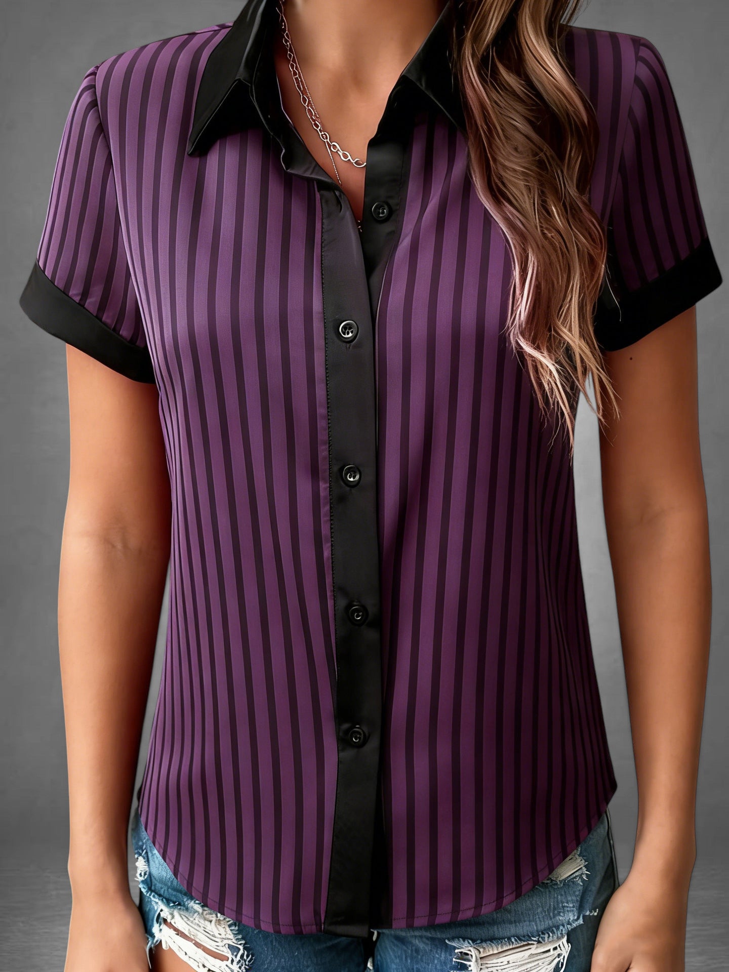 ZOFIA ATELIER purple and black striped polyester blouse with a loose fit and short sleeves.