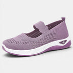 ZOFIA ATELIER purple lightweight knit walking shoes with white sole and flat heel.